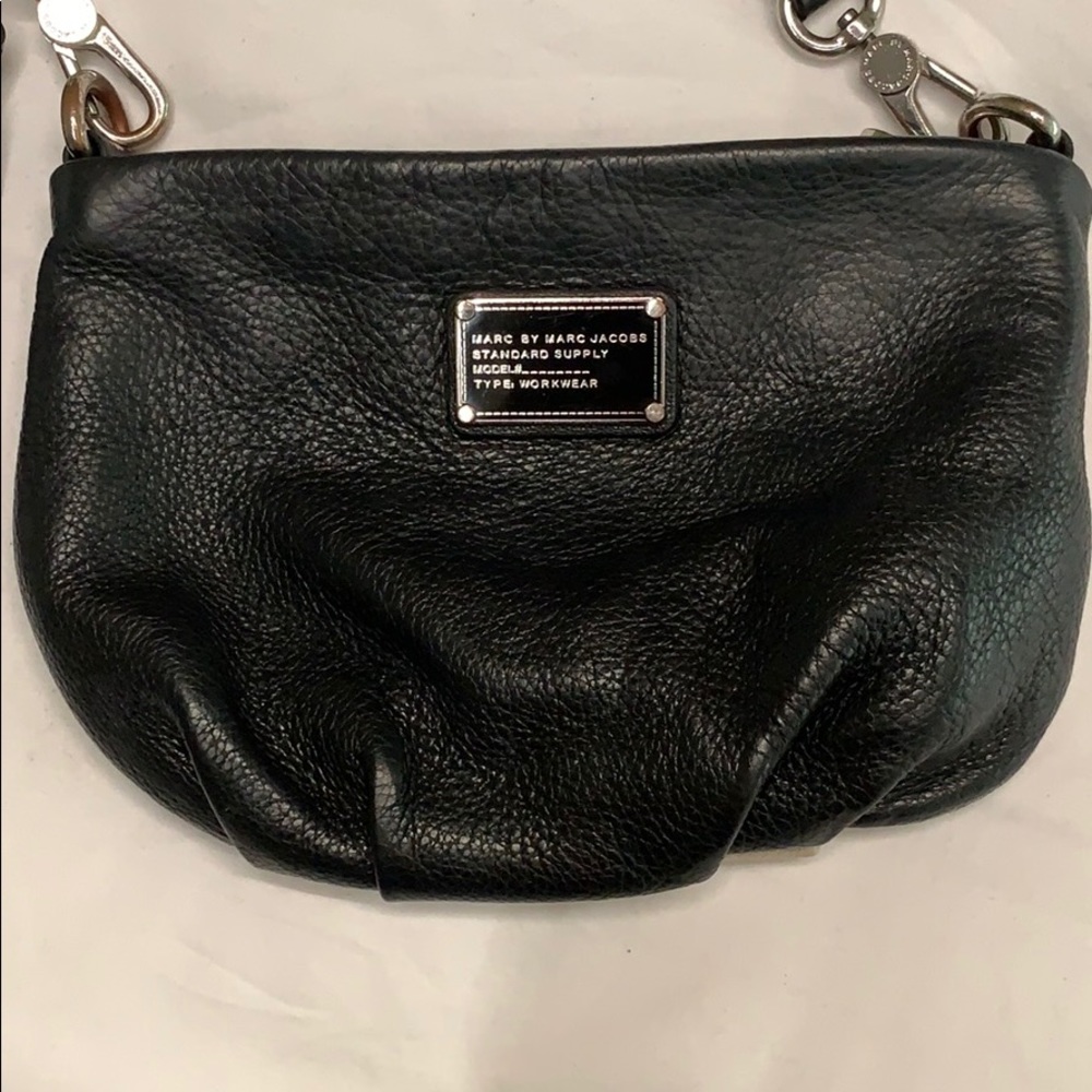 Marc Jacobs leather purse with adjustable strap.